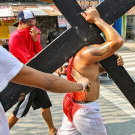 Magdarame devotees relive Christ's passion by carrying heavy crosses and flagellating themselves in San Fernando, Pampanga, during the Maleldo 2019, Holy Week Philippines, photo by Ivan Kralj