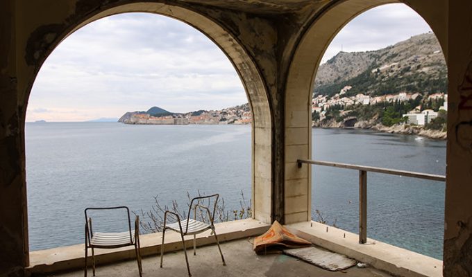 Terrace with broken chairs at Hotel Belvedere Dubrovnik, one of the abandoned hotels left to decay, photo by Ivan Kralj