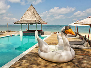 Swan floatie next to the Mooban Talay Resort swimming pool, at beachfront Mooban Talay Resort, on Koh Samed island, Thailand, photo by Ivan Kralj