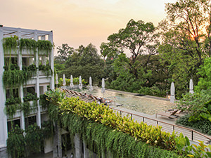 The infinity swimming pool on the top of the roof of Treeline Urban Resort, the plastic free hotel in Siem Reap, Cambodia, photo by Ivan Kralj