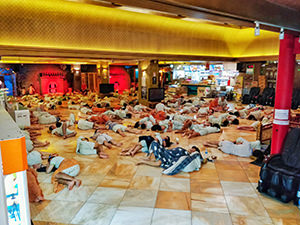 Asian bathhouse scene: visitors sleeping on the floor of the main area of Dragon Hill Spa. a Korean spa / jjimjilbang in Seoul, South Korea, photo by Ivan Kralj