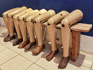 Artificial legs displayed in COPE center in Vientiane, Laos, photo by Ivan Kralj