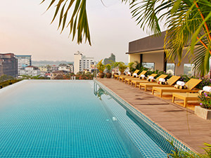 Swimming in the rooftop infinity pool at Lao Poet Hotel is one of the best things to do in Vientiane, Laos, photo by Ivan Kralj