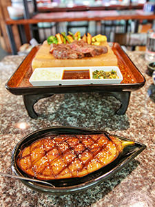 Nasu Dengaku, grilled eggplant glazed with miso, served in front of the Hakata Wagyu Steak, in Tengoku, must-visit Japanese restaurant in Chiang Mai, Thailand, photo by Ivan Kralj