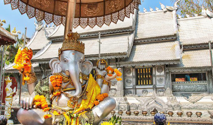Wat Sri Suphan is better known as Chiang Mai's Silver Temple. Its decoration was made in silversmith workshop, such as this elephant deity, donated with bananas and flowers offerings. Chiang Mai, Thailand. Photo by Ivan Kralj