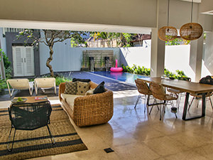 Open-air living room at pool villa in Origin Seminyak, one of the best hotels in Bali, Indonesia, photo by Ivan Kralj