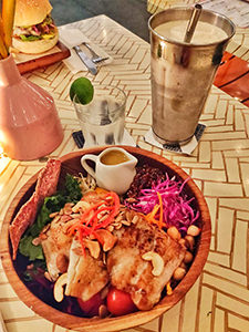 Nourish bowl with grilled barramundi, served at Sea Circus Restaurant & Bar, one of the best places to eat in Seminyak, Bali, Indonesia, photo by Ivan Kralj