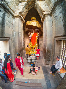 Eight-armed Vishnu statue at the west entrance gopura of Angkor Wat, the most famous Cambodian temple, photo by Ivan Kralj