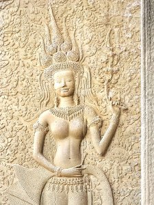 The smiling apsara carving on the walls of Angkor Wat, most famous Cambodian temple, photo by Ivan Kralj