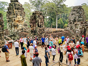 Crowds in Bayon, the most popular temple of Angkor Thom with face-towers as a special feature, photo by Ivan Kralj