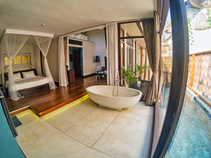 Spacious room with king size bed, stone bath tub and plunge pool in Heritage Suites Hotel, in Siem Reap, Cambodia, photo by Ivan Kralj
