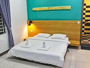 Bed in a double bedroom at Sleep Pod Hostel in Siem Reap, Cambodia, photo by Ivan Kralj