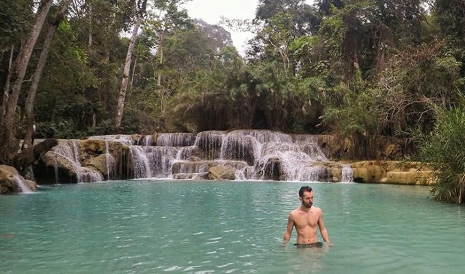 Pipeaway blogger Ivan Kralj standing in the waters of Kuang Si waterfalls in Laos, photo by Ivan Kralj