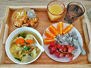 Breakfast with soup, pastries and fruit at Latima Boutique Hostel in Kanchanaburi, Thailand, photo by Ivan Kralj
