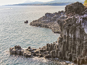 The hexagonal columns, natural pillars, on the coast of Jeju Island, are a result of volcanic processes, Jusangjeolli Cliff, South Korea, photo by Ivan Kralj