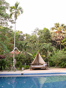 Looking for a personal space in the hotels after COVID-19? Here's the shaded daybed by the pool of Sojourn Boutique Villas in Siem Reap, Cambodia, photo by Ivan Kralj