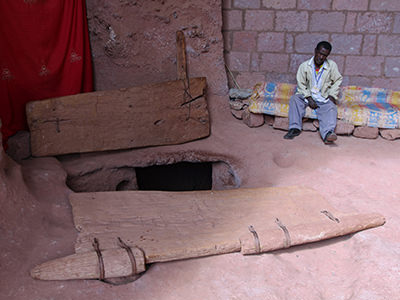 Entrance to an underground "Passage through Hell", leading to Bet Merkorios, one of Lalibela rock-hewn churches, Ethiopia, photo by Ivan Kralj