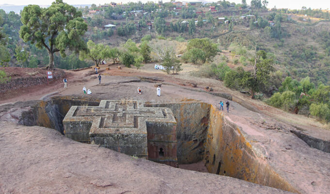 Bete Giyorgis, one of the rock-hewn churches of Lalibela, shaped like a Greek Orthodox cross. This Lalibela church is a monolith, carved out of a single block of rock. Lalibela, Ethiopia. Photo by Ivan Kralj