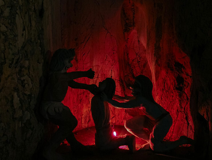 The scene of torture, the artist's representation of the Buddhist hell in Am Phu Cave, the Hell Cave of the Marble Mountain, Vietnam, photo by Ivan Kralj