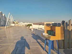 Selfie stick stand in Oia, just before Santorini sunset, without usual crowds because of COVID-19 pandemic, Greece, photo by Ivan Kralj