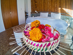 Flower basket in the bedroom of Aria Villas Ubud, Bali, Indonesia, photo by Ivan Kralj
