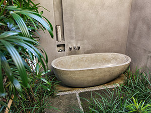 Alfresco bathtub in the hidden courtyard garden with tropical plants, Aria Villas Ubud, Bali, Indonesia, photo by Ivan Kralj
