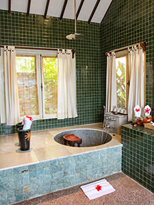 Sunken bathtub in Aloon-Aloon villa at Hotel Tugu Lombok, Indonesia, photo by Ivan Kralj