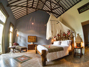 Bedroom interior in Aloon-Aloon villa at Hotel Tugu Lombok, Indonesia, photo by Ivan Kralj