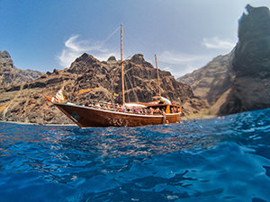 Wooden Arabian sailboat Shogun anchored by Los Gigantes in Tenerife, Spain, photo by Ivan Kralj