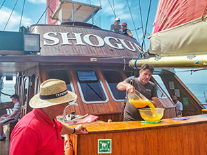 DJ Andy making a homemade sangria on Shogun sailboat during the Tenerife whale watching excursion, Spain, photo by Ivan Kralj
