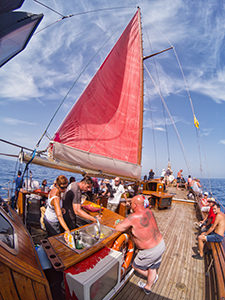 Sun-burned man standing at the bar of Shogun sailboat during the Tenerife whale watching excursion, Spain, photo by Ivan Kralj