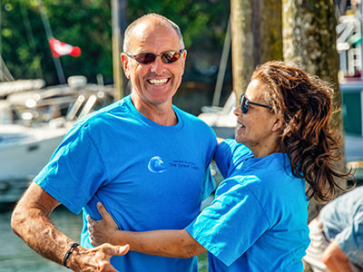 Bert terHart hugged by his wife Nani on return from his 9-month trip of sailing around the world