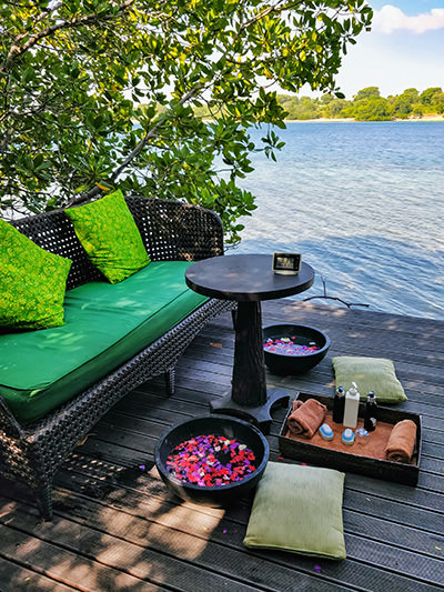 Set-up for a footbath ritual next to the Bali Sea at the Mangrove Spa, The Menjangan Resort, Bali, Indonesia, photo by Ivan Kralj