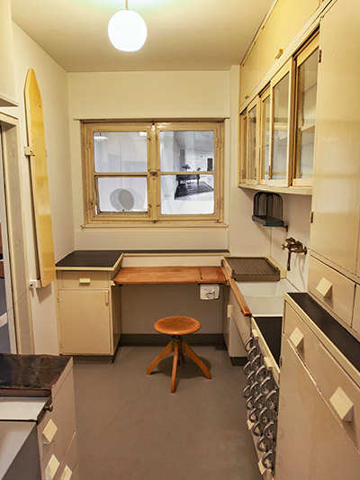 Frankfurt Kitchen as designed by the first Austrian female architect Margarete Lihotzky for New Frankfurt project, as displayed at Vitra Design Museum's "Home Stories" exhibition, photo by Ivan Kralj