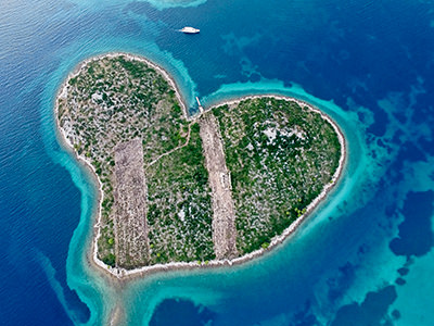 Heart-shaped island of Galešnjak in the Adriatic Sea, Croatia, so-called Lovers' Island, aerial photo by Boris Kačan