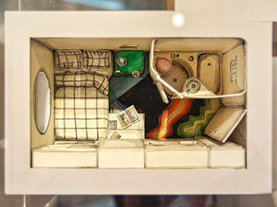 Top view of Charlap Hyman & Herrero model of the living unit in Kisho Kurokawa's Nakagin Capsule Tower, with a fitted bed, desk, some storage cabinets and a tiny bathroom, as exhibited at Vitra Design Musuem in Weil am Rhein, Germany, photo by Ivan Kralj