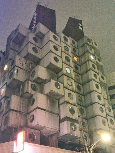 Stacked capsule living units in Nakagin Capsule Tower in Tokyo, Japan, by the architect Kisho Kurokawa, photo by Ivan Kralj