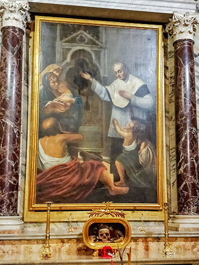 The skull of Saint Valentine, the patron saint of Valentine's Day, displayed on the alter in Basilica of Santa Maria in Cosmedin, in Rome, Italy, photo by Ivan Kralj