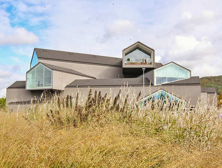 Stacked houses architecture of Herzog & de Meuron at Vitrahaus, Vitra Home Collection, at Vitra Campus in Weil am Rhein, Germany, photo by Ivan Kralj