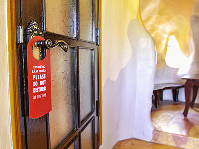 "Do not disturb" sign at the door of one of the rooms at Crazy House hotel in Dalat, Vietnam, photo by Ivan Kralj