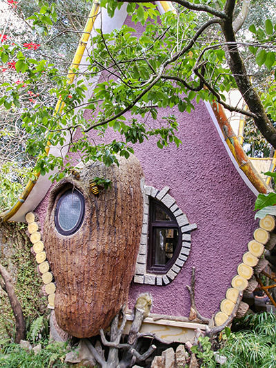 The exterior of the honeymoon lodge, with a beehive and bees as elements of the architecture at the Crazy House Dalat hotel in Vietnam, photo by Ivan Kralj