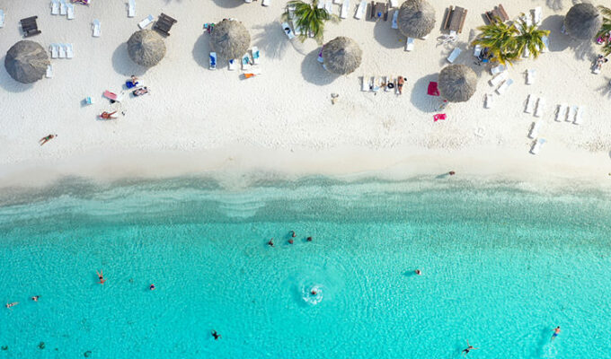 Top view of the sandy beach in Curacao, one of the Caribbean countries that introduced digital nomad visas, copyright Curaçao Tourist Board