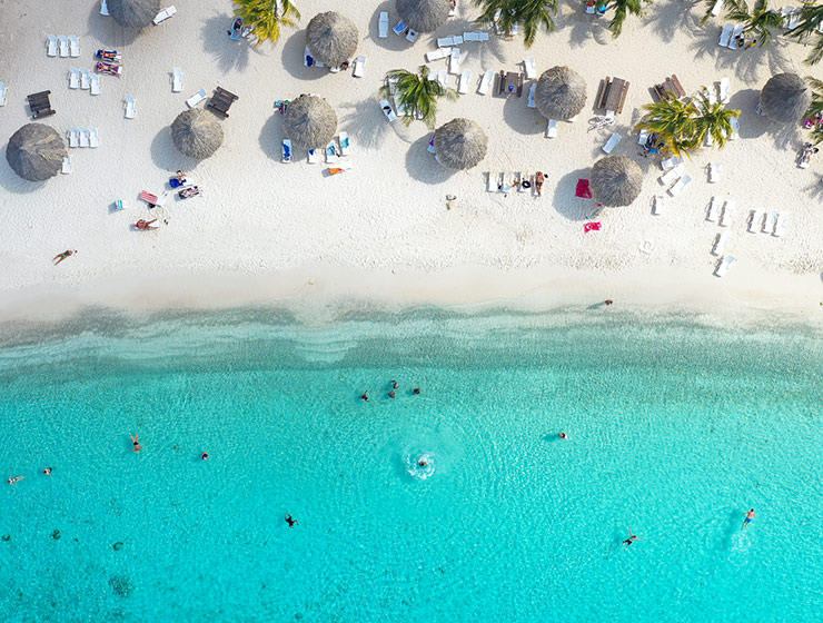 Top view of the sandy beach in Curacao, one of the Caribbean countries that introduced digital nomad visas, copyright Curaçao Tourist Board