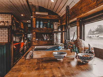 Sink in the kitchen of the Painted Buffalo Traveling Studio, a converted school bus - a house on wheels, by Jessica Rambo