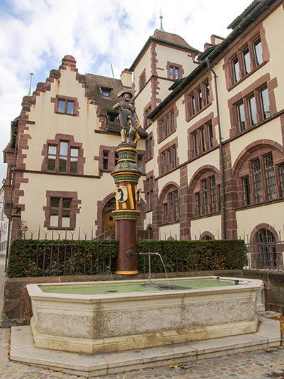 Water fountain in front of the Martinkirsche church in Basel, Switzerland, one of the many city fountains providing free drinking water, and a place to bathe, photo by Ivan Kralj