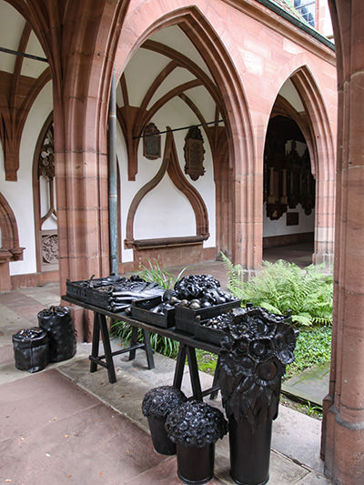 "Market table" artwork by the artist Bettina Eichin, permanently exhibited in the cloister of Basel Munster, one of the places you must visit during your Basel tour. Photo by Ivan Kralj