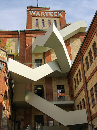 The unusual zig-zag staircase of the Warteck Workroom, former brewery, today a creative hub, one of the interesting tourist sites to visit in Basel, Switzerland. Photo by Ivan Kralj