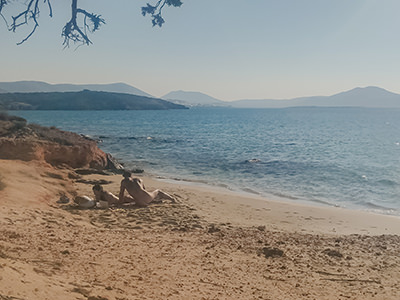 Naked couple on Lageri Beach in Paros, one of the best nude beaches in Cyclades Islands, Greece, photo by Ivan Kralj