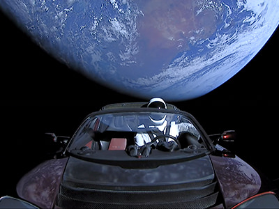 Falcon Heavy Demo Mission sending Tesla electric car with a Starman astronaut doll out of the Earth's orbit, photo by SpaceX