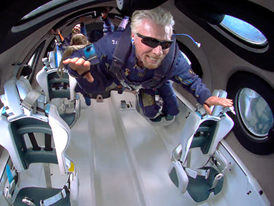 Sir Richard Branson floating in space in microgravity on board his Unity spacecraft, photo by Virgin Galactic